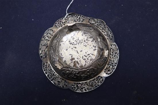 A Chinese white metal shallow basket with pierced border, diameter 18.5cm.